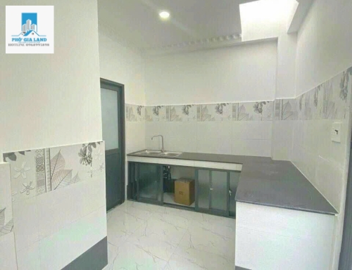 BÁN NHÀ MẶT TIỀN HẺM XE HƠI THÔNG HTP  + P. PHÚ THUẬN , QUẬN 7 .