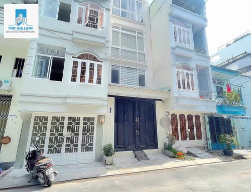 BÁN NHÀ 4 TẦNG MẶT TIỀN ĐƯỜNG LÝ PHỤC MAN - QUẬN 7 .