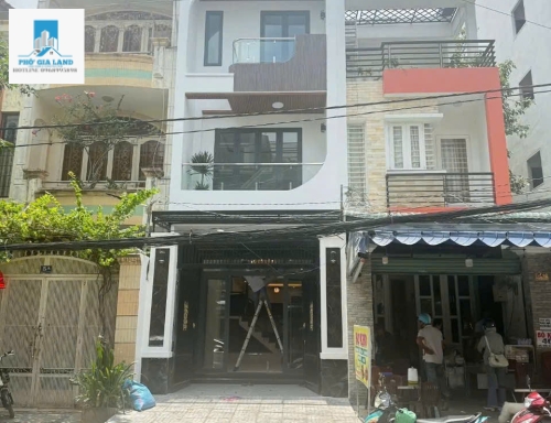 BÁN NHÀ MẶT TIỀN ĐƯỜNG PHAN HUY THỰC , QUẬN 7 .