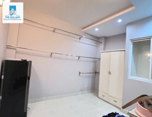 NHÀ 4 TẦNG - MẶT TIỀN LÝ PHỤC MAN  - QUẬN 7 . 