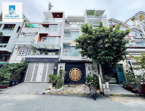 NHÀ 4 TẦNG CÓ THANG MÁY - PHÚ THUẬN , QUẬN 7 .