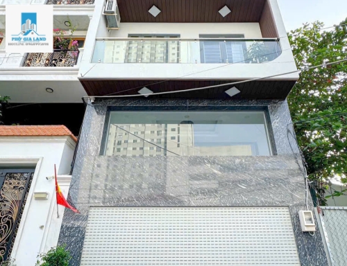 MẶT TIỀN HUỲNH TẤN PHÁT CÁCH 15M - CÓ THANG MÁY - XE HƠI 6M - QUẬN 7 .