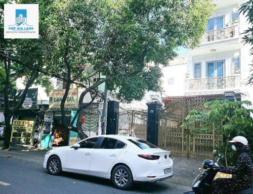 NHÀ 4 TẦNG CÓ THANG MÁY - GÓC 2 MẶT TIỀN ĐƯỜNG XE HƠI 8m - QUẬN 7 .