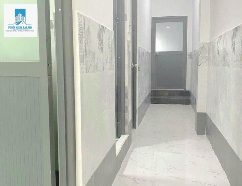 BÁN NHÀ MẶT TIỀN HẺM XE HƠI THÔNG HTP  + P. PHÚ THUẬN , QUẬN 7 .