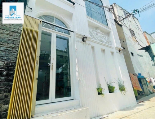 Bán nhà 205/huỳnh tấn phát , quận 7 .