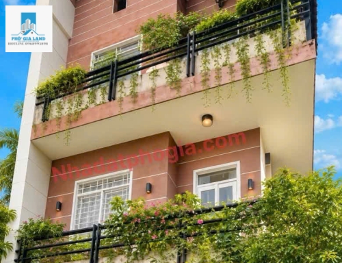 NHÀ 3 TẦNG GÓC MẶT TIỀN ĐƯỜNG XE HƠI KHU LÝ PHỤC MAN – QUẬN 7 .